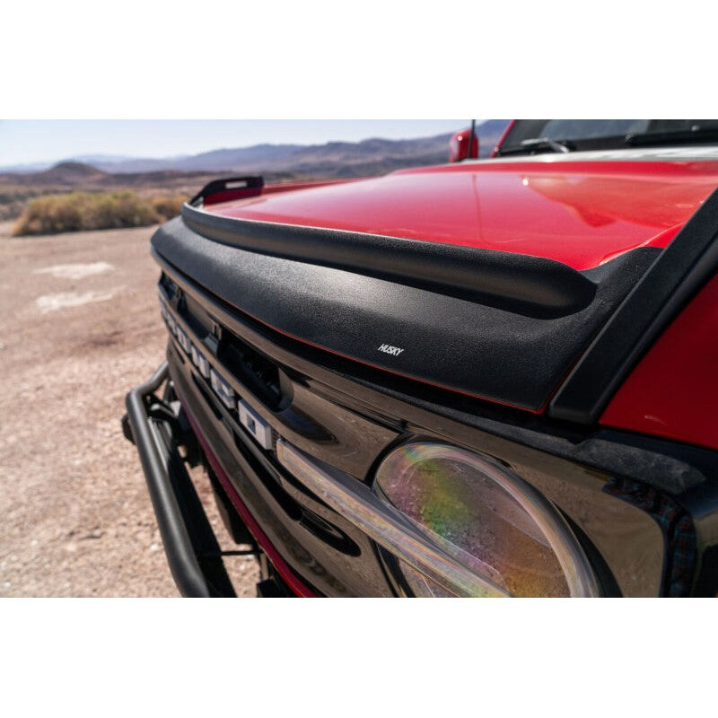 Textured black Husky Liners Aeroskin II hood protector with raised lip for 2021-2026 Ford Bronco.