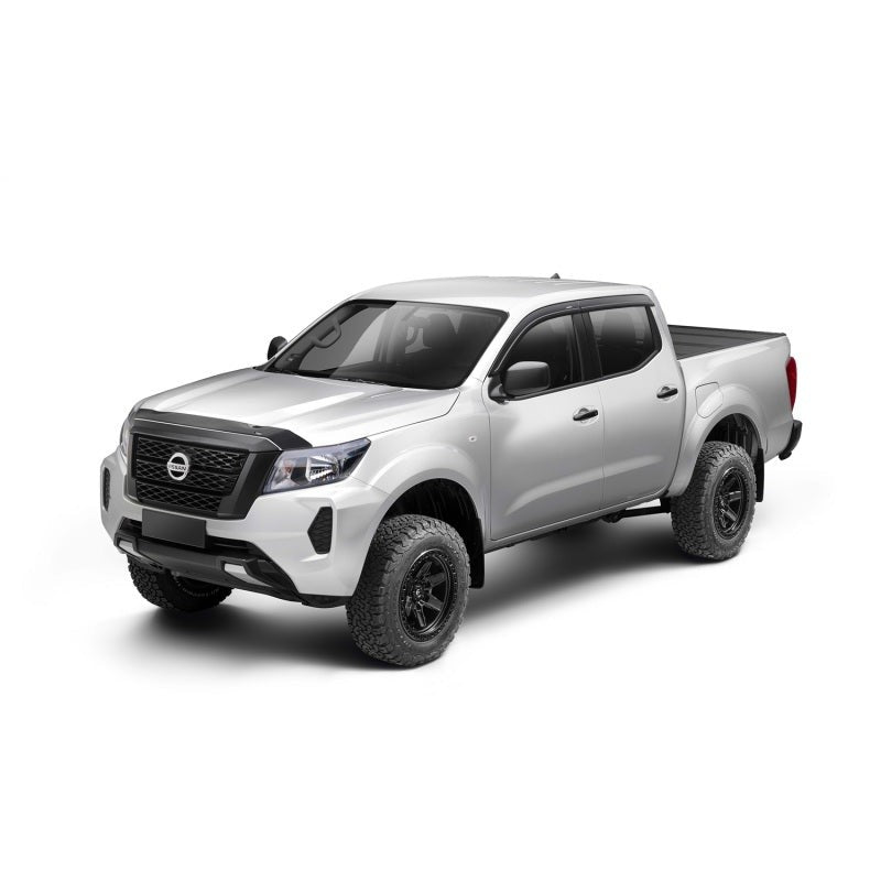Smoke finish Husky Liners Aeroskin low-profile acrylic hood protector installed on a 2022-2026 Nissan Frontier
