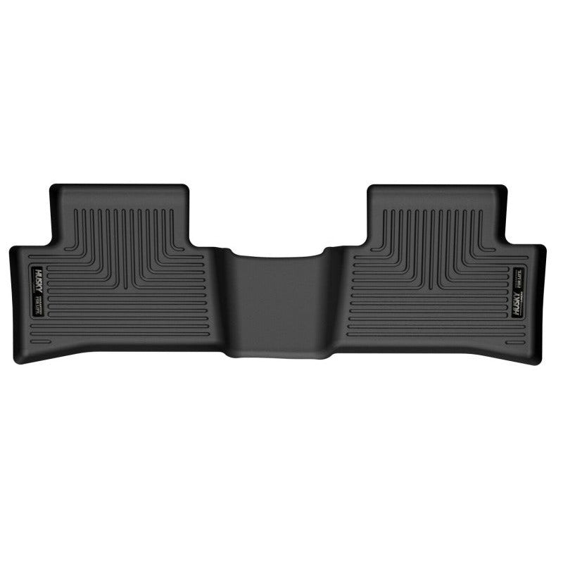 Black Husky Liners WeatherBeater second row floor liners showing laser-scanned FormFit contours and StayPut Cleats.