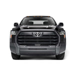 Husky Liners Aeroskin hood protector in dark smoke finish showing low-profile fitment on a vehicle hood.