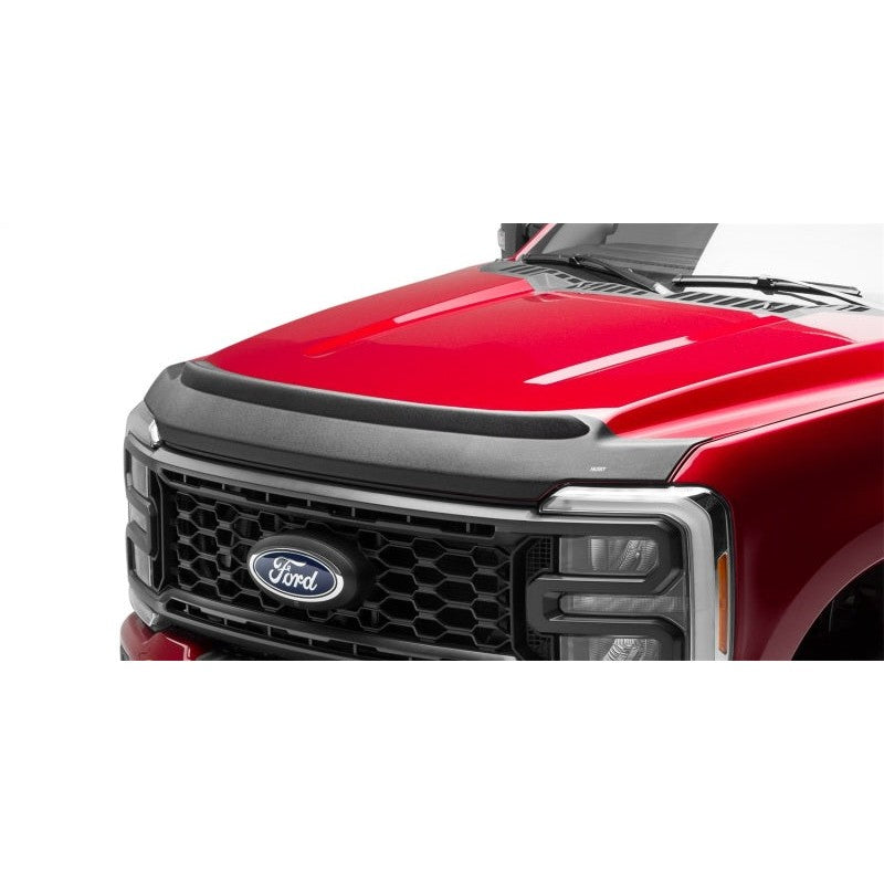 Textured black Husky Liners Aeroskin II hood protector installed on a 2023-2026 Ford F-Series Super Duty truck hood.