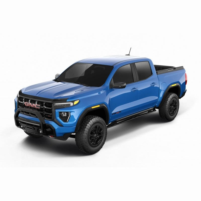 Dark smoke Husky Liners Aeroskin hood protector shown mounted on the front edge of a GMC Canyon hood.