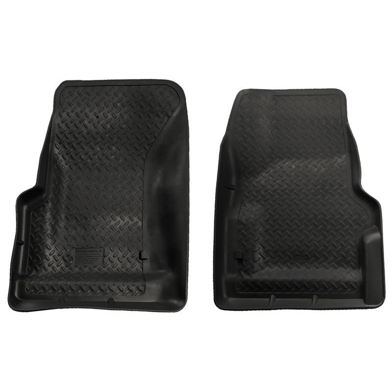 Husky Liners Classic Style black floor liners with diamond plate texture and StayPut Cleats for 1997-2006 Jeep Wrangler.