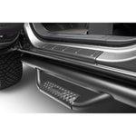 Textured black Husky Liners Trail Armor rocker panel and sill plate covers for 2001-2007 Chevrolet and GMC trucks.