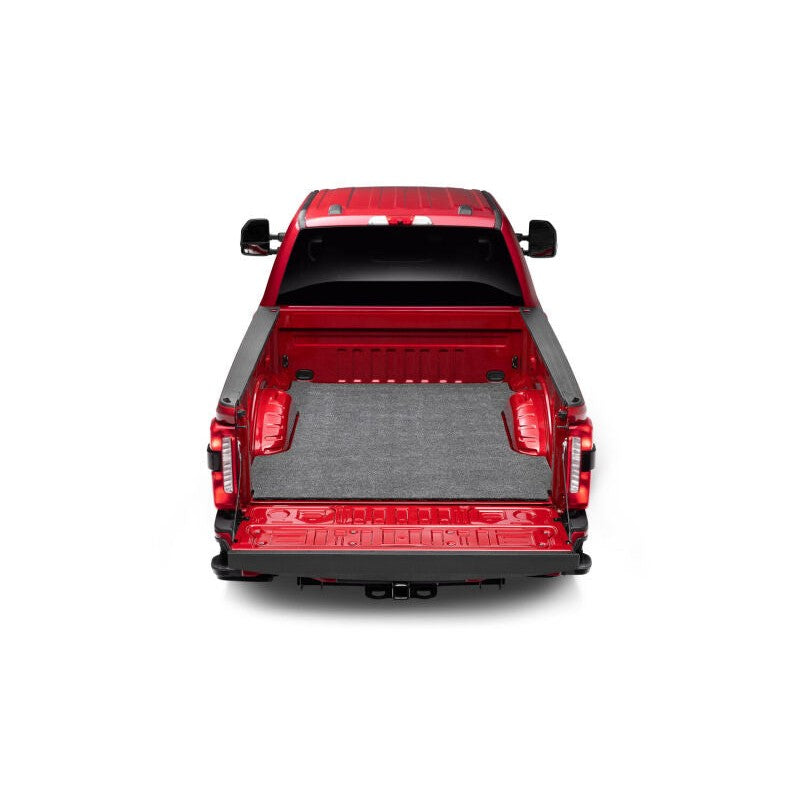 Husky Liners Guardian Comfort Bed Mat showing the flat, high-grip DriGard surface for a Chevrolet Silverado 6.6ft bed.