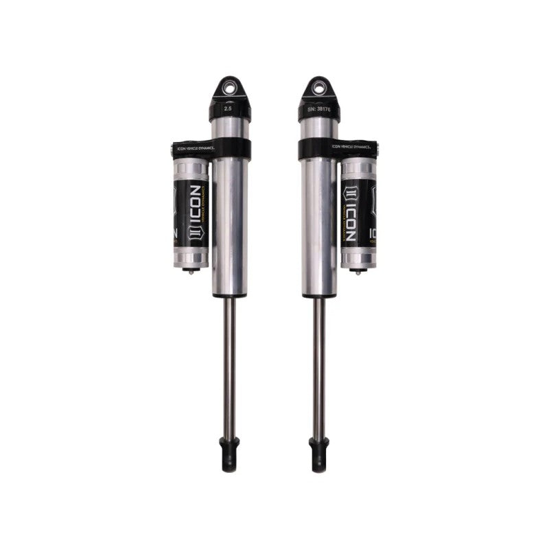 Pair of silver ICON V.S. 2.5 Series rear shocks with piggyback reservoirs and black CNC machined components.