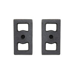 ICON Vehicle Dynamics 1-inch cast iron rear lift blocks with semi-gloss black finish and integrated center pins.
