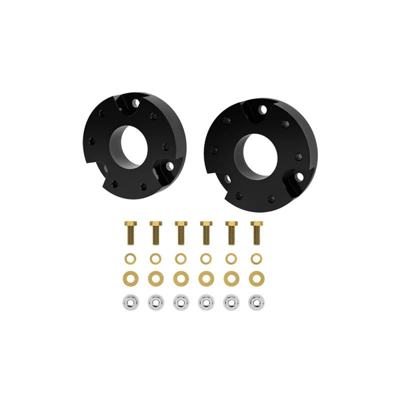 Black anodized CNC machined 6061 billet aluminum 2-inch front lift spacers with mounting hardware for 2023-2024 GM trucks.
