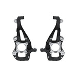 ICON Vehicle Dynamics black powder coated ductile iron front steering knuckles for 2021-2025 Ford F-150 4WD.