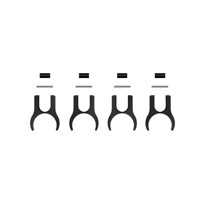 Black anodized 6061 aluminum hose routing clamps for 1.75-inch rear links on a Ford Bronco.