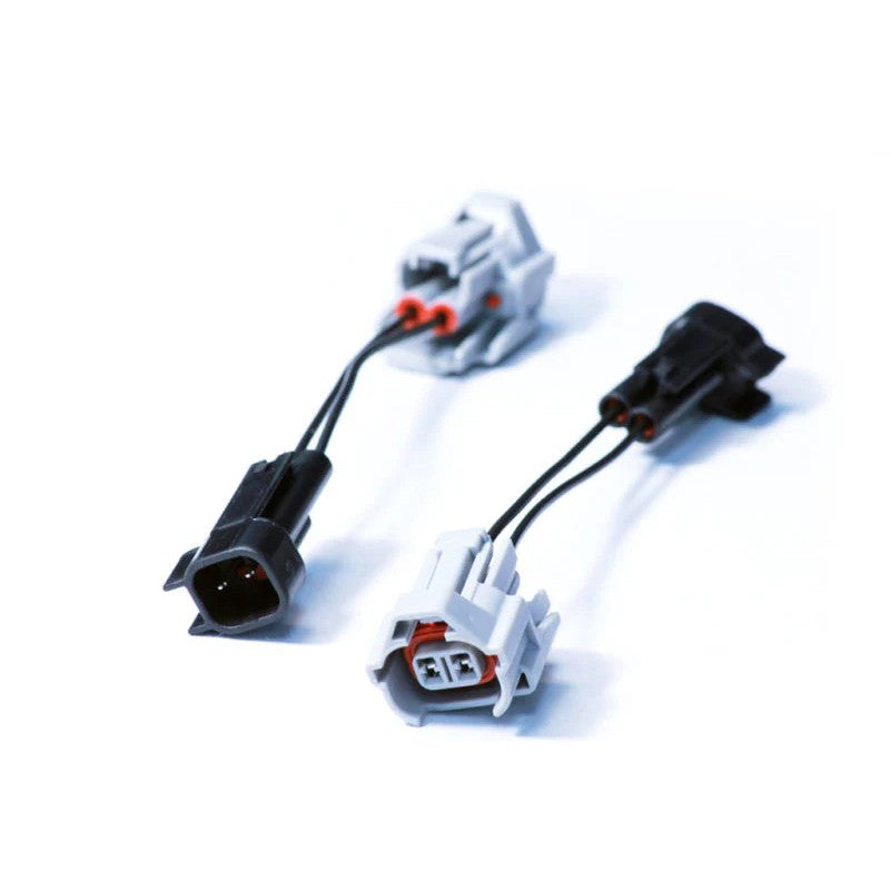 Injector Dynamics 90.7 plug-and-play wiring adapter with Denso and USCAR style connectors.
