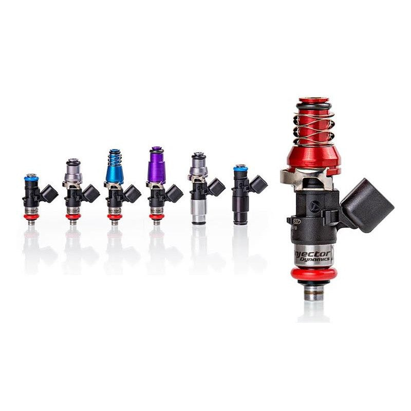 Set of six Injector Dynamics ID1050X fuel injectors with purple 14mm top adapters and Denso style lower seals.