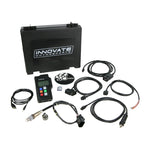 Innovate LM-2 digital air/fuel ratio meter with LCD display, OBD-II connection cable, and wideband sensor wiring.