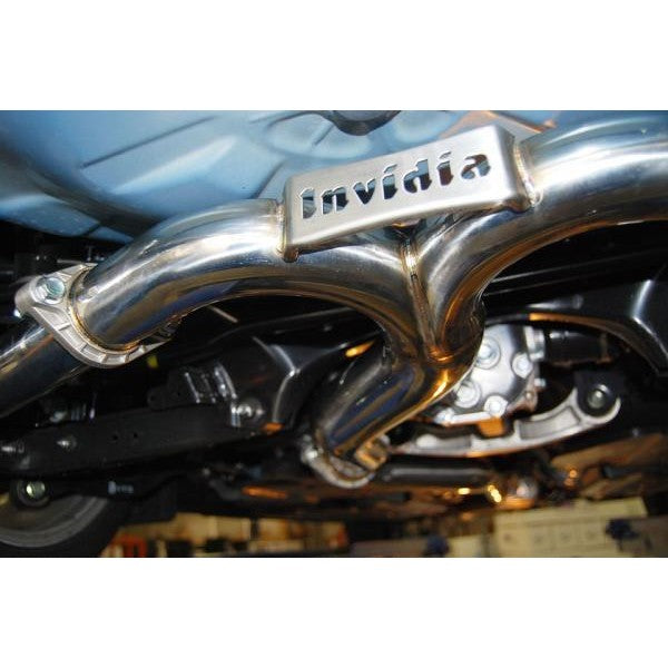 Invidia Q300 cat-back exhaust system featuring twin mufflers and four burnt titanium rolled tips for Subaru WRX STI.