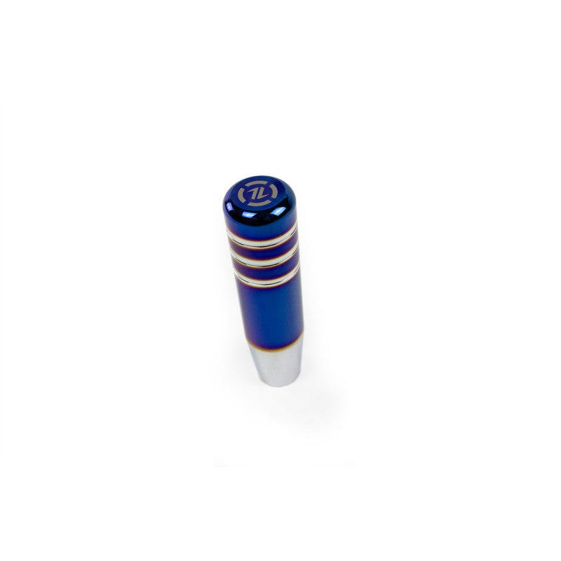 ISR Performance manual transmission shift knob featuring a sleek brushed titanium finish and weighted ergonomic design.