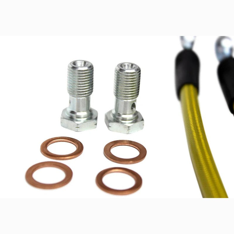 A pair of ISR Performance braided stainless steel rear brake lines for Nissan 240sx S13 and S14 with silver fittings.