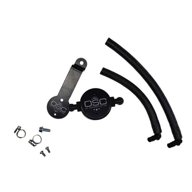 Black anodized billet aluminum J&L 3.0 oil separator for 2016-2023 Toyota Tacoma 3.5L driver side.