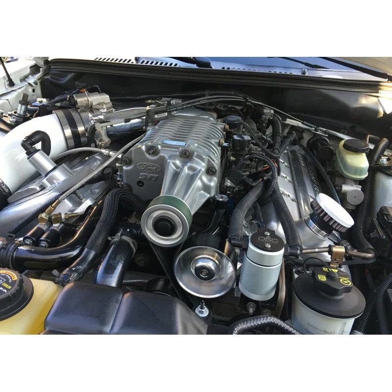 Clear anodized J&L 3.0 driver side billet oil separator for 1999-2004 Ford Mustang SVT Cobra and Mach 1.