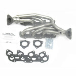 JBA Cat4Ward raw 409 stainless steel shorty headers with 1-1/2 inch primaries for Toyota 4.7L V8 engines.