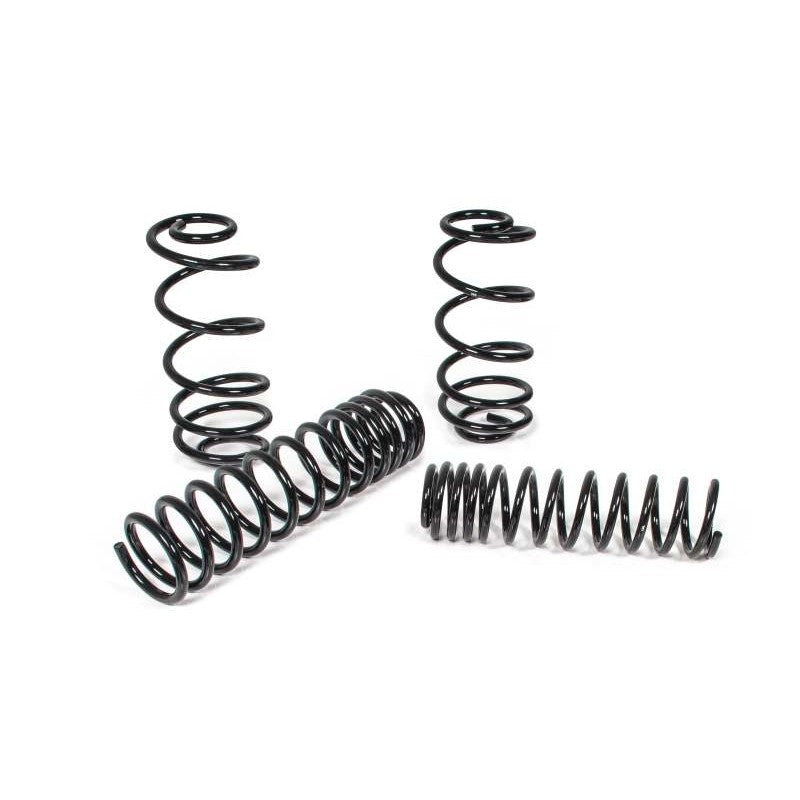 Set of four black JKS JSPEC dual-rate 2-inch lift coil springs for 1997-2006 Jeep Wrangler TJ and LJ.