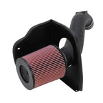K&N 57 Series performance air intake kit with HDPE tube and red conical air filter for 2001-2004 6.6L HD trucks