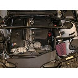 K&N 57-1003 performance intake kit including black HDPE tube, conical oiled cotton air filter, and custom heat shield.