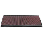K&N 33-2189 high-flow drop-in air filter featuring red pleated cotton media and a black flexible frame.