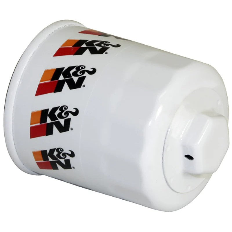 K&N HP-1003 Performance Gold oil filter featuring a heavy-duty canister and a welded one-inch hex nut for easy removal.