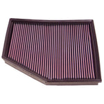 K&N 33-2294 washable high-flow replacement air filter with red oiled cotton media for 2004-2010 BMW V8 models.