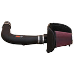 K&N 57-2557 Performance Air Intake System with black HDPE tube, heat shield, and red oiled cotton air filter.
