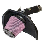 K&N 69 Series Typhoon short ram intake with black mandrel-bent tube, oiled air filter, and heat shield for Subaru Legacy.