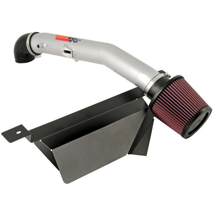 K&N Typhoon short ram intake with silver mandrel-bent aluminum tube, red conical filter, and black heat shield.