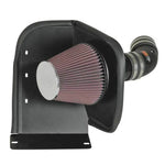 K&N AirCharger performance intake system 63-3059 with black HDPE tube, conical red air filter, and black heat shield