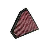 K&N 33-2332 high-flow drop-in air filter with red oiled cotton media and black polyurethane frame.