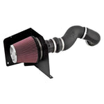 K&N 57-3067 performance air intake system with black HDPE induction tube and red oiled cotton air filter.