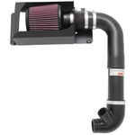 K&N 69 Series Typhoon short ram intake system with black aluminum tube, conical red filter, and custom heat shield
