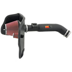 K&N AirCharger intake system with black HDPE tube, conical red oiled air filter, and custom metal heat shield.