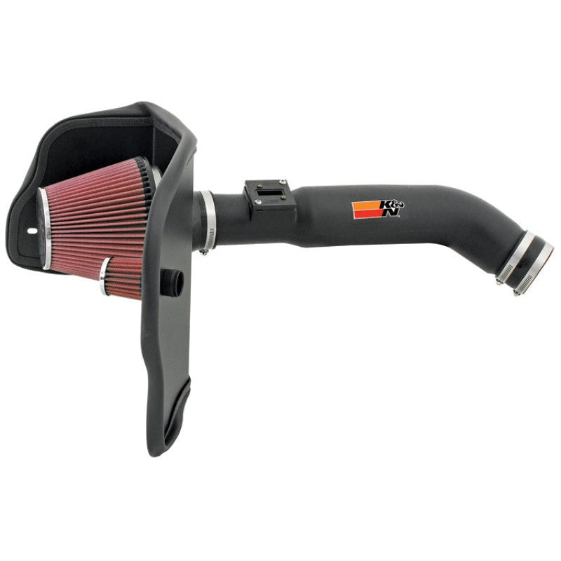 K&N AirCharger intake system with black HDPE tube, conical red oiled air filter, and custom metal heat shield.