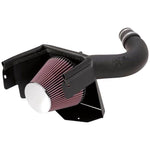 K&N cold air intake kit 57-1553 with black HDPE tube and red conical air filter for 2007-2011 Jeep Wrangler V6-3.8L