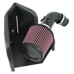 K&N Typhoon Series short ram intake system with mandrel-bent aluminum tube and red conical high-flow air filter.