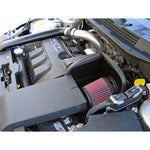 K&N 57 Series cold air intake system with black HDPE tube and conical oiled cotton filter for Dodge Caliber SRT-4