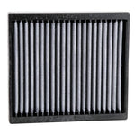 K&N VF2004 washable cabin air filter featuring white pleated synthetic filtration media and a black flexible frame.