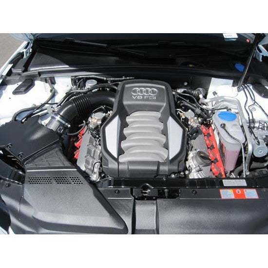 K&N E-1987 High-Flow drop-in air filter showing red pleated cotton media and durable rubber seal.