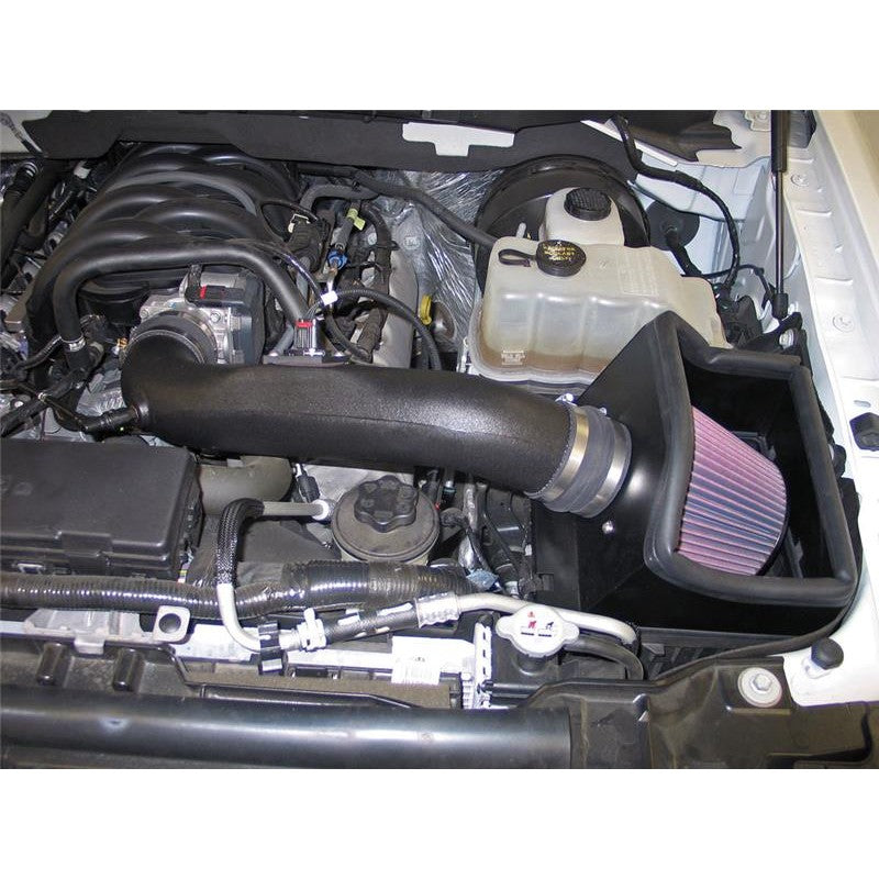 K&N performance intake kit for Ford F-150 with HDPE tube, heat shield, and red oiled cotton conical air filter