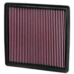 K&N 33-2385 rectangular high-flow air filter with red oiled cotton media and black rubber frame.