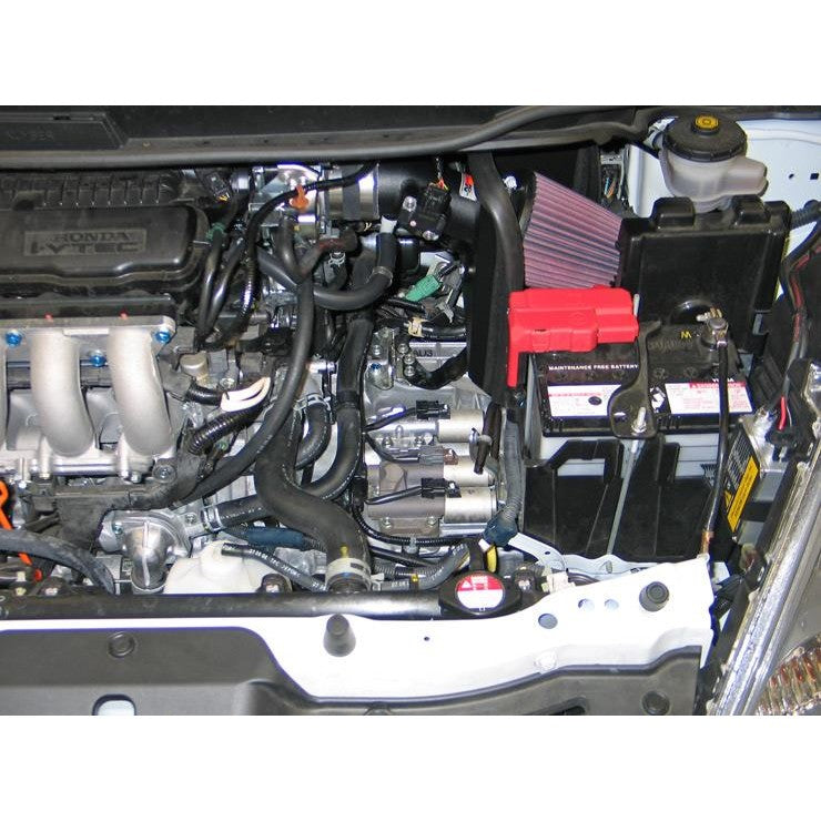 K&N Typhoon short ram intake with mandrel-bent aluminum tube and red conical high-flow air filter for 2009-2013 Honda Fit