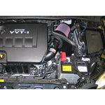 K&N Typhoon short ram intake with mandrel-bent aluminum tube and conical air filter for 1.8L Toyota Corolla.