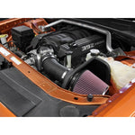 K&N 63 Series AirCharger performance intake kit with black HDPE tube, conical oiled cotton filter, and heat shield.