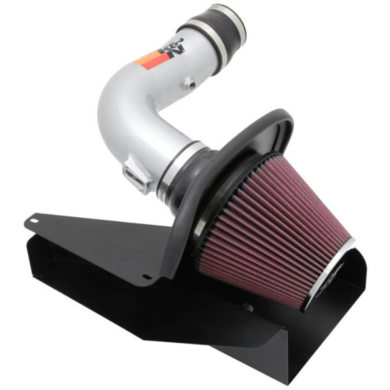 K&N 77 Series silver intake system with mandrel-bent aluminum tube and red conical air filter for 2011-2014 Ford Edge.