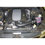K&N 63-1563 AirCharger intake system with HDPE tube, oversized conical air filter, and custom heat shield